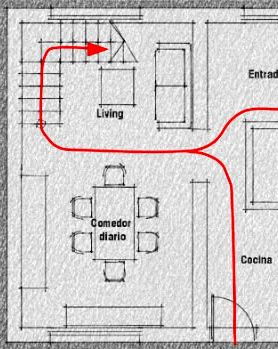 Plano 04: la escalera de esta casa esta en el living (que dificulta su amueblado) y que incluso la familia no usa como tal. Debajo de la escalera ha quedado un espacio residual y observese como la escalera ha toma parte de la ventana (que mira a la calle)